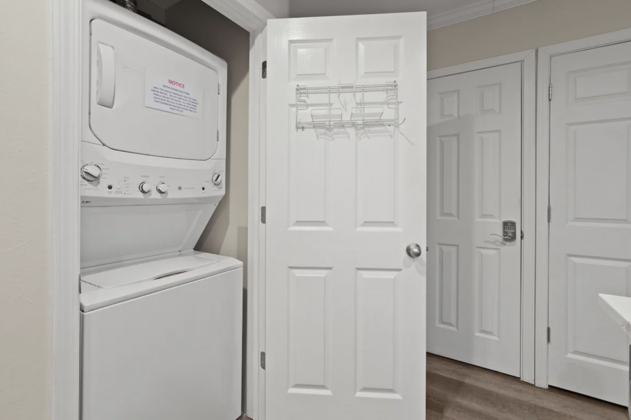 Washer/dryer located in the kitchen.
